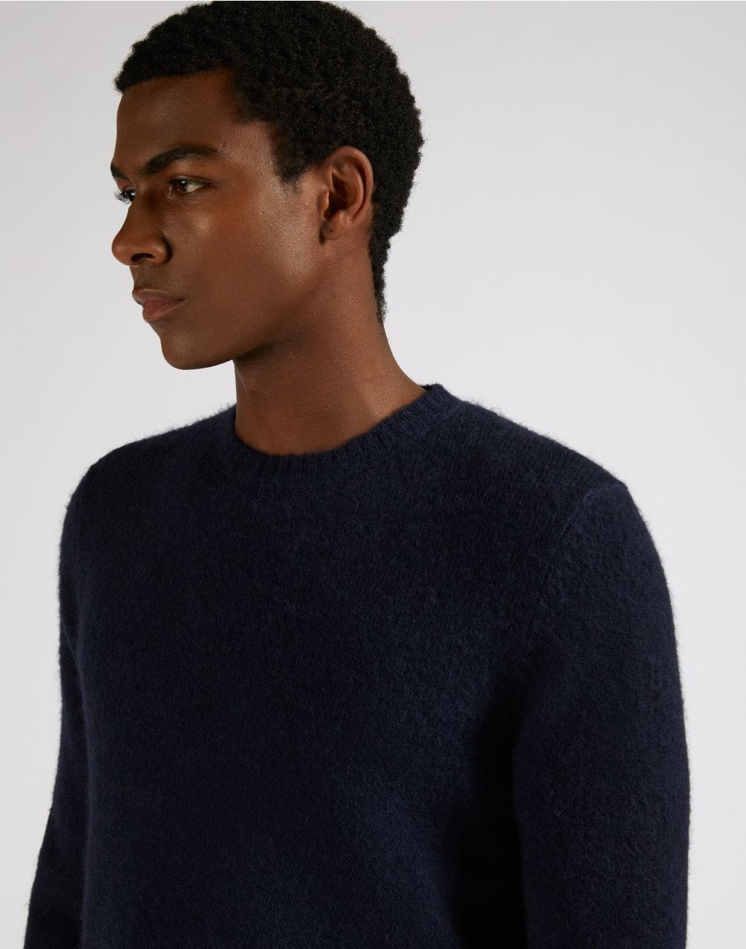 Blue crew-neck plain knit sweater