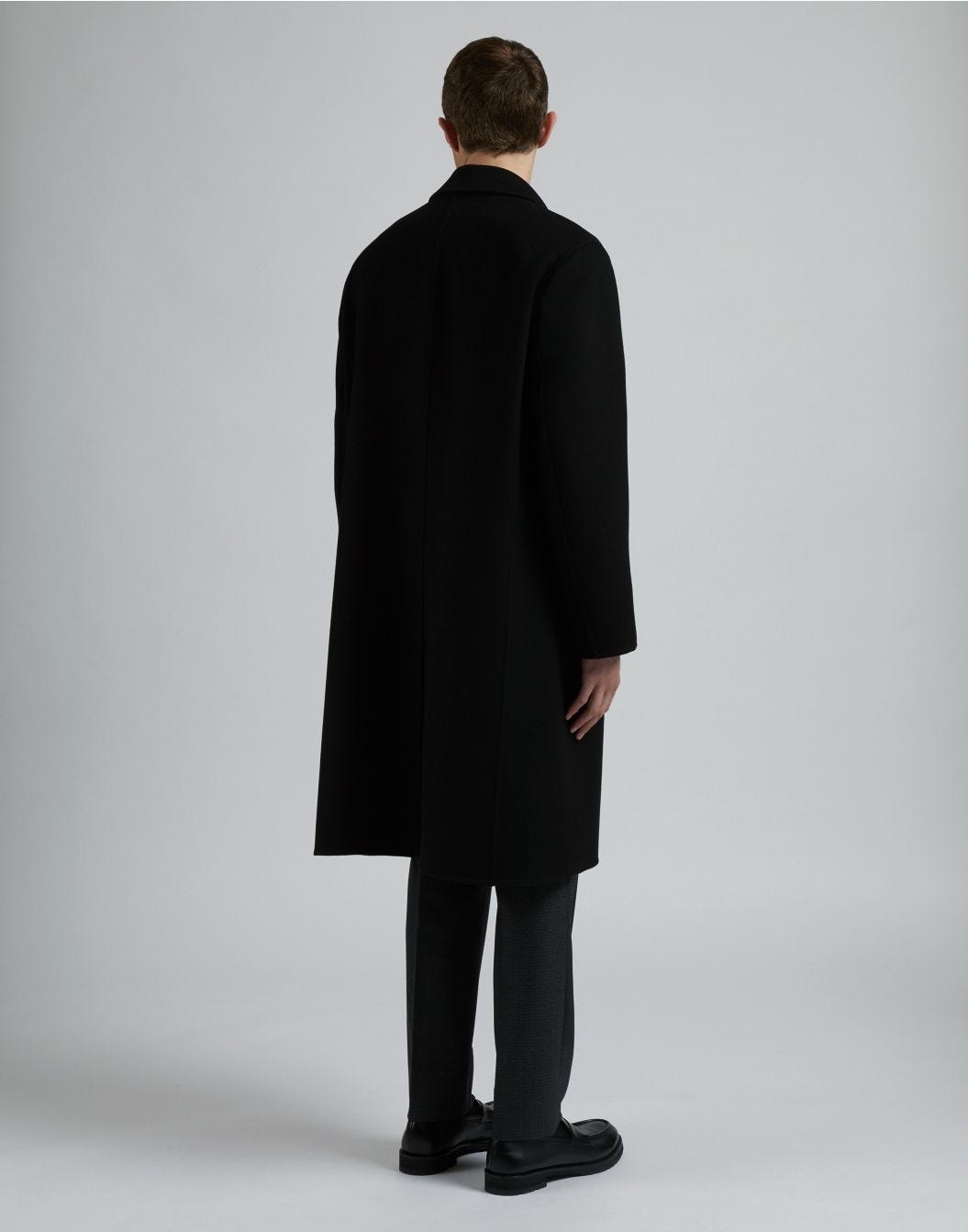 Black wool single-breasted coat with front placket