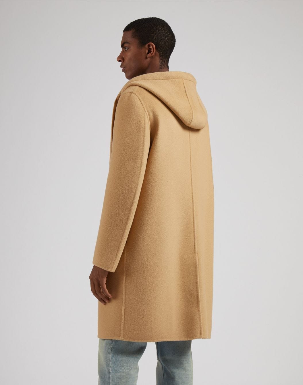 Single-breasted beige wool coat with a hood and drawstring