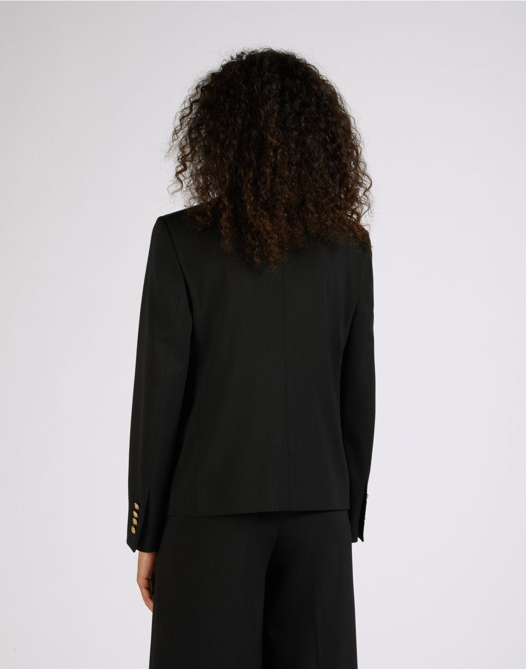 Short black single-breasted jacket made of stretch wool serge