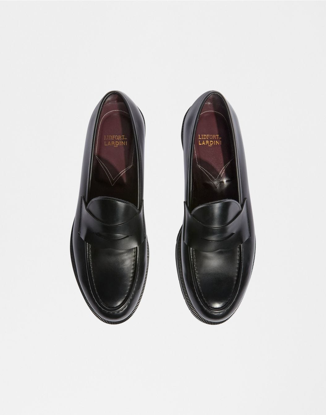 Black leather loafer with heel