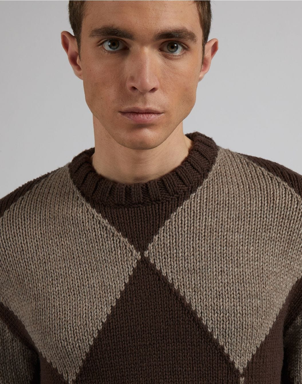 Brown crew-neck sweater with two-tone hazelnut intarsia.