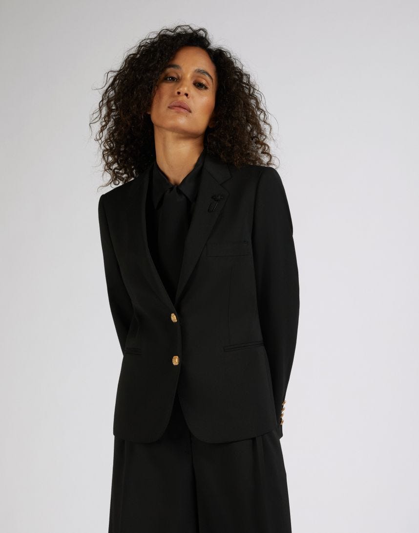 Short black single-breasted jacket made of stretch wool serge