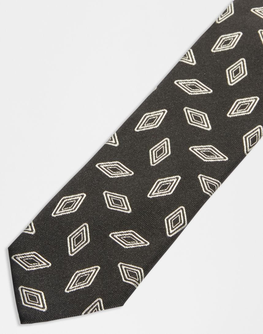 Cravatta in pura seta con disegno geometrico a contrasto 